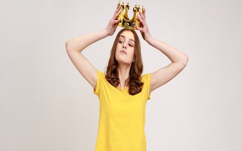 Portrait,Of,Selfish,Brown,Haired,Teenage,Girl,In,Yellow,T-shirt